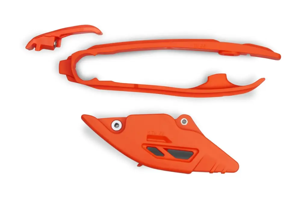 Cenově Výhodný UFO komplet kluzák + vodítko řetězu KTM SX 125 / 250 / 300 23-25, SXF (SX-F) 250 / 350 / 450 23-25, EXC 150 / 250 / 300 24-25, EXCF (EXC-F) 350 / 450 / 500 24-25 barva oranžová (KT05017001 + KT05018001)